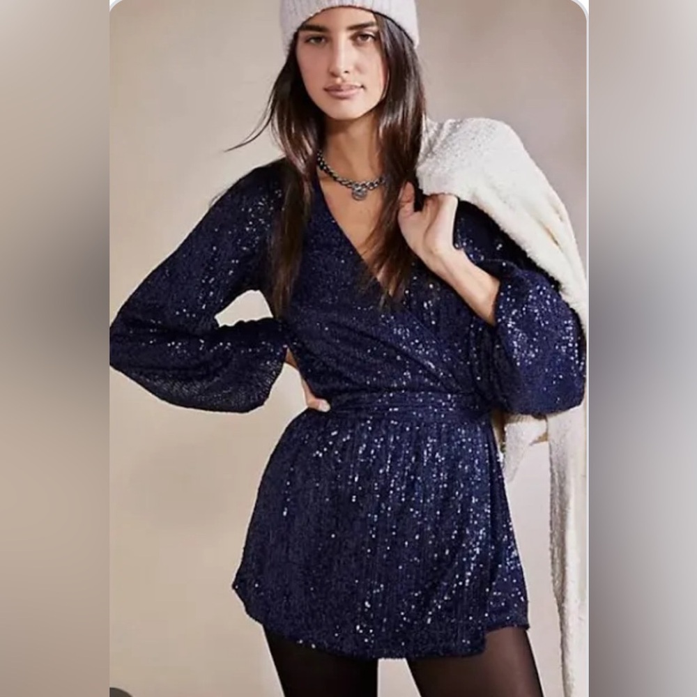 Free people. Sequin wrap dress. Skort. Work once. Great condition. Blue.